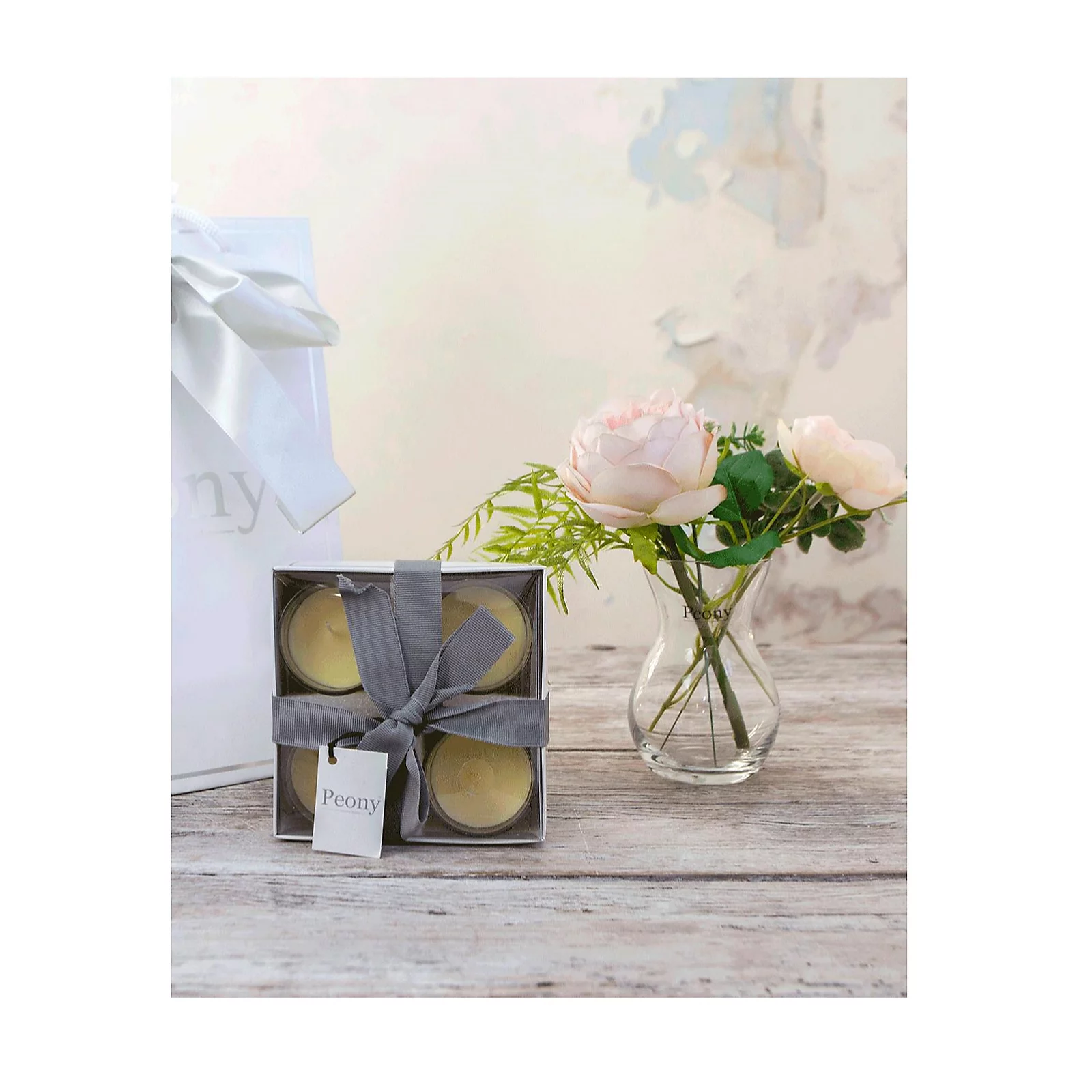 Peony Roses, Ranucula & Foliage in a Dainty Hourglass Vase w/ 4 Candles & Bag 5 Peony Roses, Ranucula & Foliage in a Dainty Hourglass Vase w/ 4 Candles & Bag